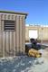 Individual sleeping next to commuter rail platform in California. Image Credit: Volpe Center.