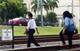 Trespassers walking past no trespass sign. Image credit: Volpe center.