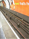 Anti-suicide pits in an underground station in the United Kingdom. Image credit: Volpe Center.